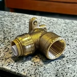 Sharkbite 1/2" Drop Ear Elbow - Push-to-connect Plumbing Fitting. Fixed Price $15.99.